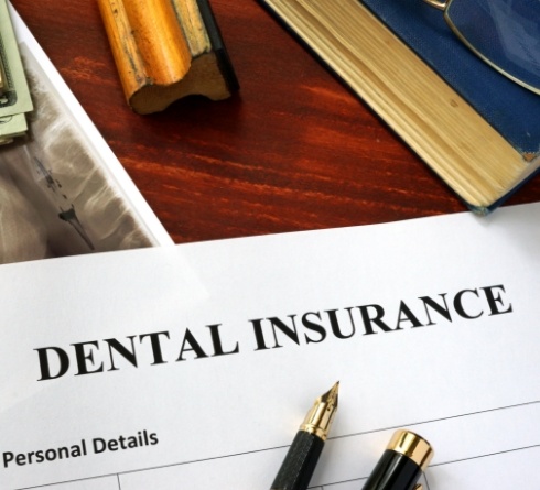 Dental insurance form on desk